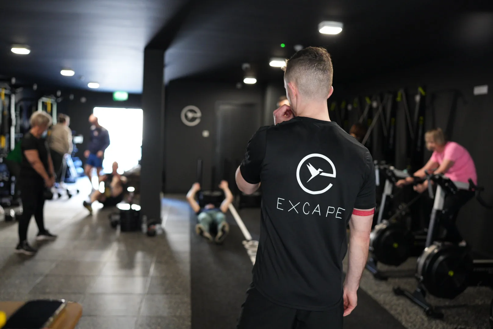 An Excape coach on the floor mid session