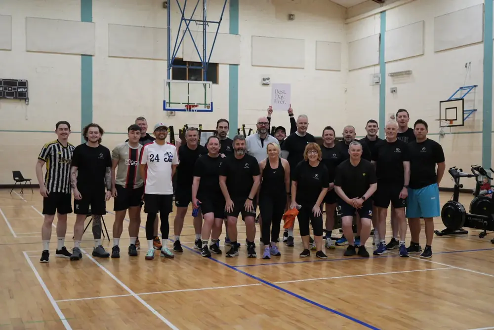 Excape members gathered at a community event