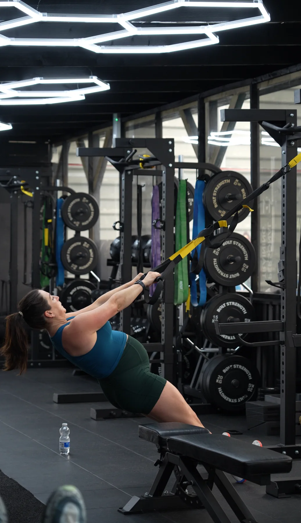 A member working through a landmine press at Excape